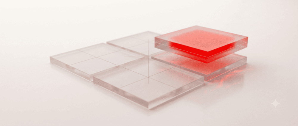 Four glass quadrant tiles, the top-right one raised and red